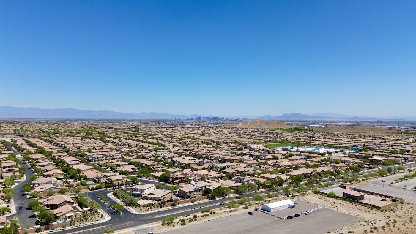 Aerial view of an East Valley desert suburb with mountains beyond